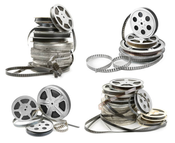 istock Collections old film strip in metal bobbins isolated on white. Various angles. 1699042017