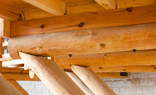 istock A structure made of logs. Log building from the inside. Log construction. Carpentry construction from logs. 1699042595