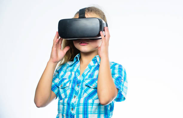 istock Virtual reality concept. Kid explore modern technology virtual reality. Girl cute child with head mounted display on white background. Virtual education for school pupil. Get virtual experience 1699046508