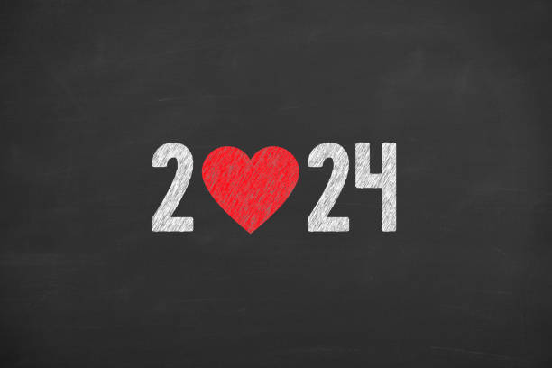istock New Year 2024 with Heart Shape on Chalkboard Background 1699056348