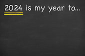 Drawing 2024's my year to on blackboard background