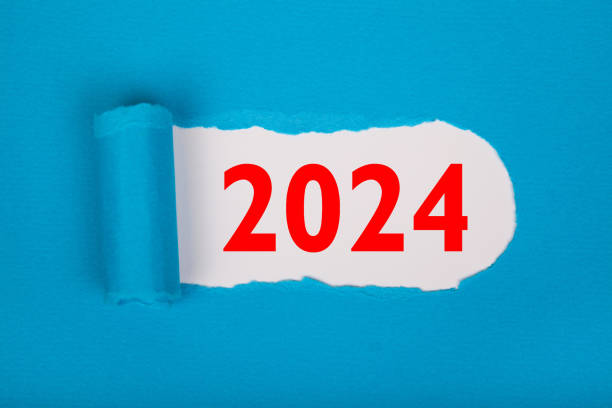 istock Torn Paper With Happy New Year 2024 On White Background 1699062459