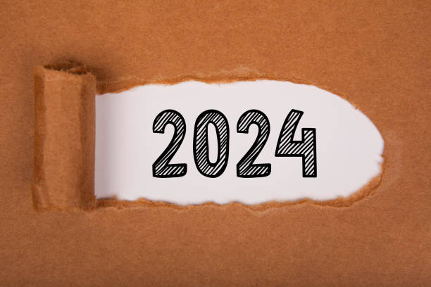 istock Torn Paper With Happy New Year 2024 On White Background 1699063516