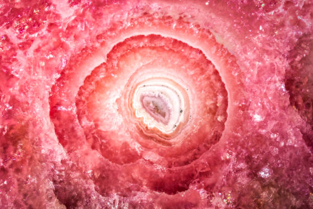 Rhodochrosite macro detail texture. close-up polished semi-precious gemstone.
