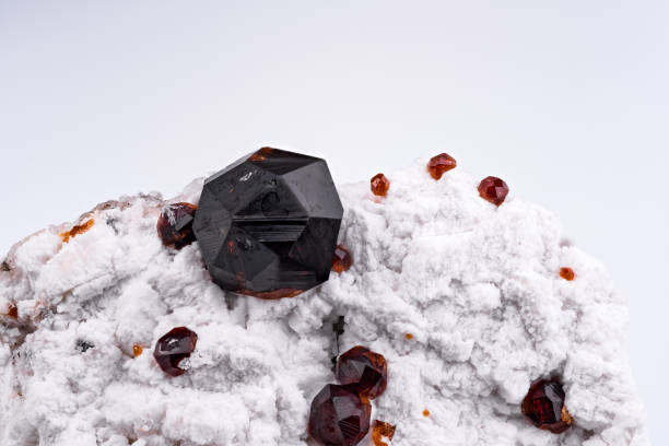 istock Spessartine garnet on orthoclase matrix 1699081631