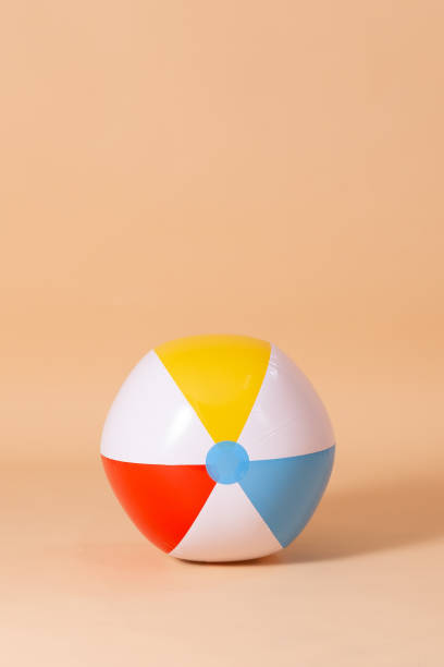 istock colorful beach ball on color background 1699094163