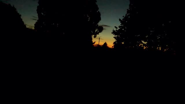 Sunset over a suffolk cottage garden