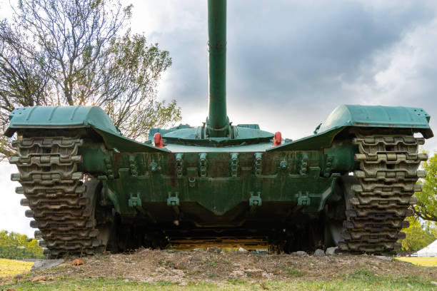 istock Soviet-made old green T-72 tank from the front and from below 1699135587