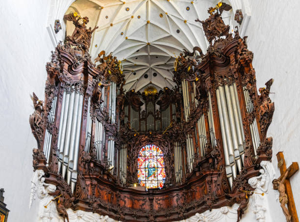 istock Ancient musical organ in a gothic church 1699141041