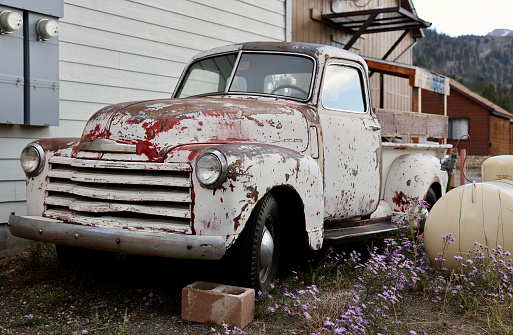 Closeup of abandoned rusty pickup truck from the 1950s