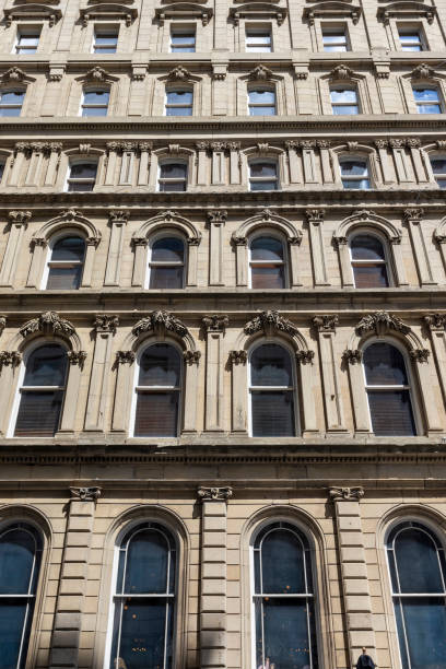 istock Facade of old building in downtown Montreal, Canada 1699215877