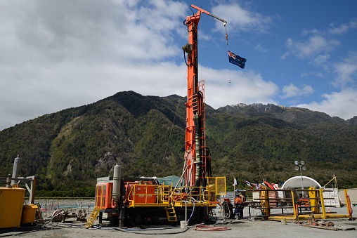 Whataroa, New Zealand, December 2, 2014: Drillers  on the Deep Fault Drilling Project, Whataroa, New Zealand. Geologists expect to gain knowledge of earthquakes from core samples of the Alpine Fault.