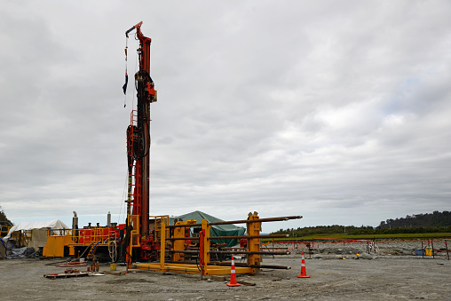 Whataroa, New Zealand, December 2, 2014: Drillers  on the Deep Fault Drilling Project, Whataroa, New Zealand. Geologists expect to gain knowledge of earthquakes from core samples of the Alpine Fault.