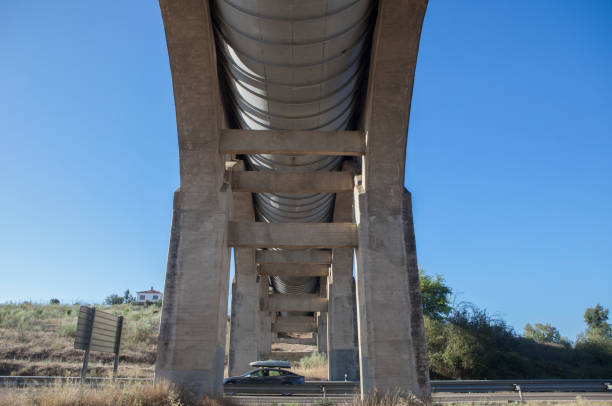 istock Vehicule crossing under Acedera Aqueduct, Spain 1699241121