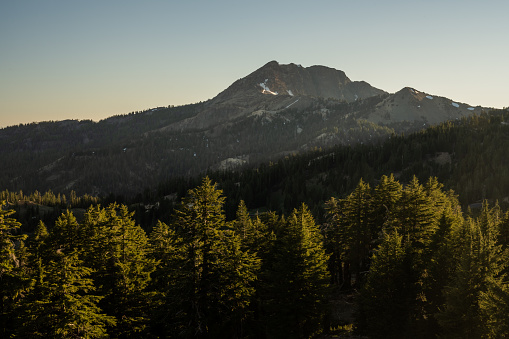 Layers of Forest And Shadow Below Lassen Peak on quiet evening