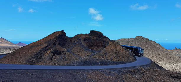 istock Volcanic Crater and Surrounding Road, Lanzarote, Spain 1699284732