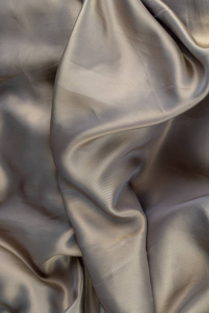 istock part of the fabric from beige-colored clothing 1699296520