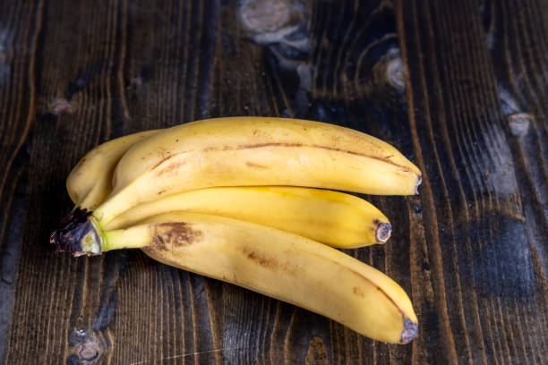 istock Ripe yellow bananas on the table 1699297047