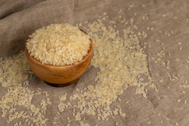 istock a large amount of uncooked fresh polished rice 1699298459