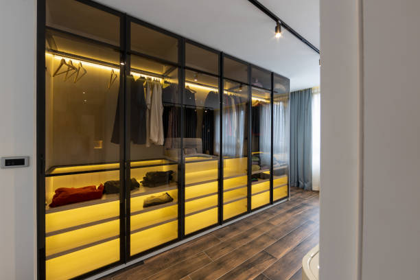 istock Glass see through closet in modern apartment 1699325805