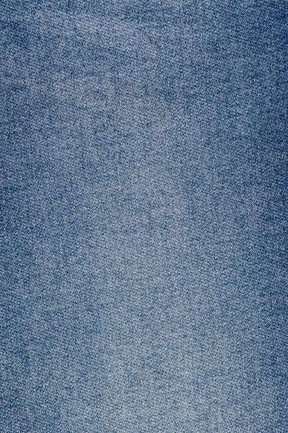 istock blue denim fabric made of cotton, close up 1699330578