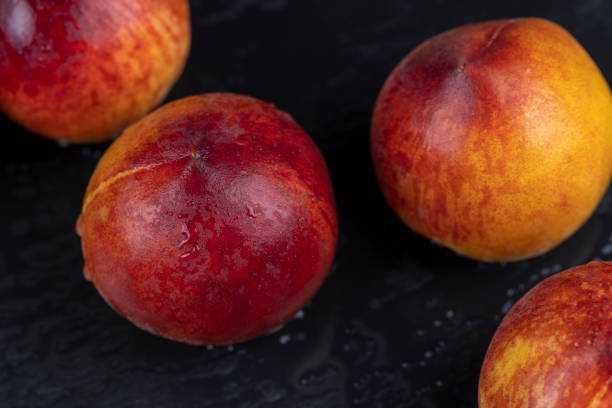 ripe delicious and fresh peaches of a red hue