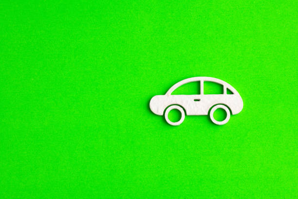 istock electric car icon - Clean energy concept. Green background 1699339951