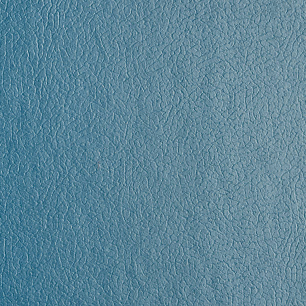 Synthetic blue color leather for pattern background. Closeup decoration texture material stock photo