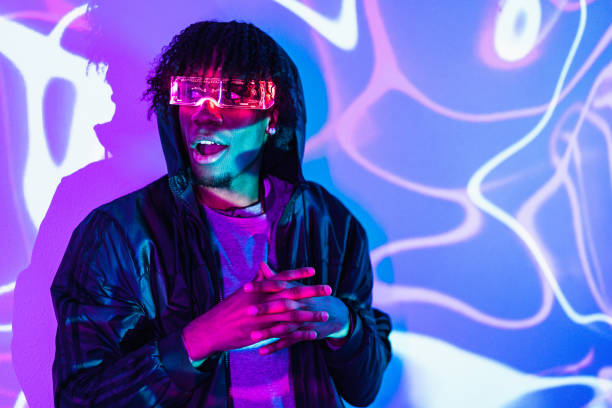 istock Amazed futuristic afro man wearing an augmented reality goggles 1699372637