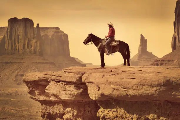 Photo of Native American Indian Cowboy on Horse in the Southwest Landscape