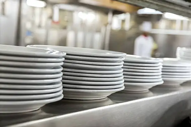 Photo of Commercial kitchen showing dishes