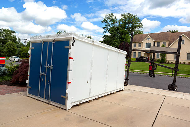Portable storage unit delivery a portable storage unit is being delivered to a residence portability stock pictures, royalty-free photos & images