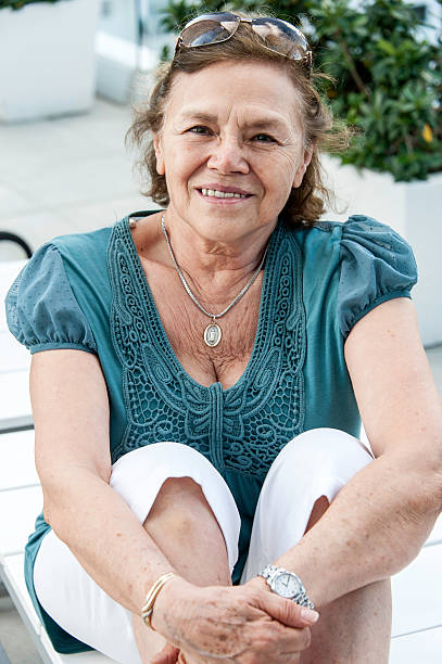 istock Senior woman smiling 169940315