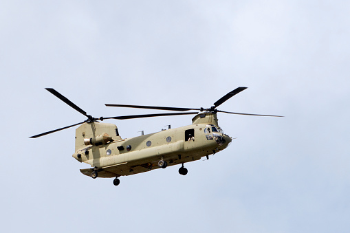 Helicopter in US military paint. Boeing CH-47 Chinook.