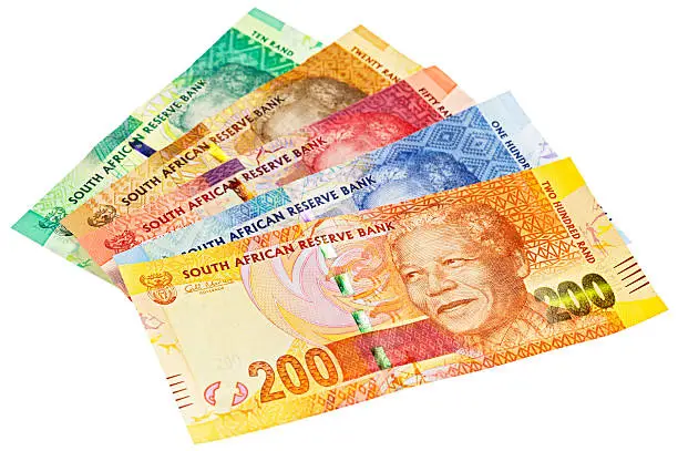 A sheaf of the new South African banknotes, including all denominations (Ten, Twenty, Fifty, One Hundred and Two Hundred Rands) and all  featuring the iconic statesman Nelson Mandela. This is the complete set. Isolated on white. 