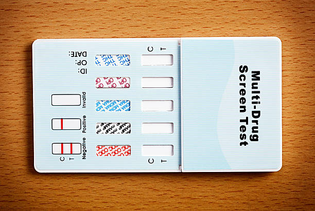 Multi-drug test kit with blank results slots A multi-drug urine testing kit, designed for use at home. The results slots are blank for you to add "negative" or "positive" symbols, if desired.  opium poppy photos stock pictures, royalty-free photos & images