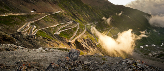 Stilfser Joch - Passo dello Stelvio in the clouds at dawn.