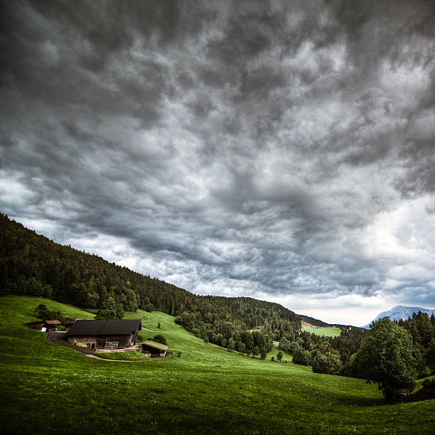 в barn - moody sky dark saturated color extreme terrain стоковые фото и изображения