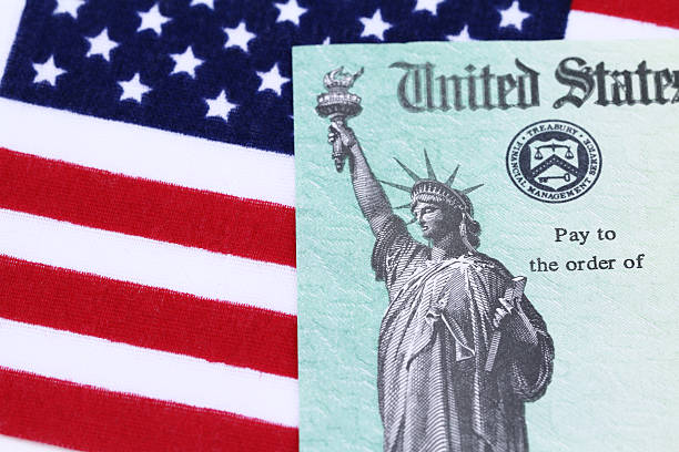 istock IRS tax refund check on American flag 169941409