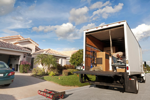 Real appliance delivery man delivering a dishwasher