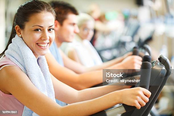 Group Of People Doing Exercising In Modern Gym Stock Photo - Download Image Now - Active Lifestyle, Activity, Adult