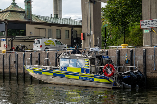 Stockholm, Sweden A police boat in the   Hammarby lock passes from   the Baltic Sea into Lake Malaren.