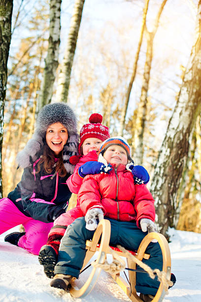 istock Family in a winter park 169943367