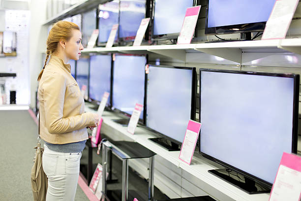 istock Woman is looking for TVs to buy 169943891