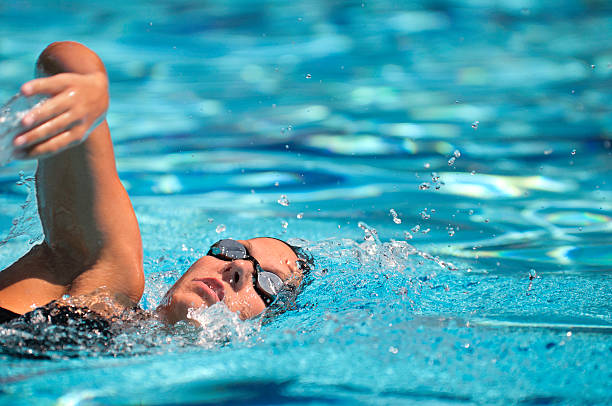Free style swimmer in action