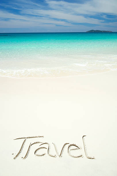 istock Travel Message Handwritten on Tropical Beach 169945120