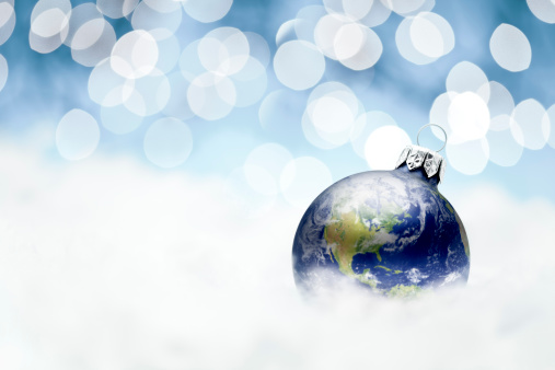Composite of the earth as christmas bauble. Please note this is an open aperture shot with a very shallow depth of field.