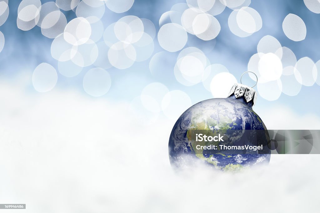 Earth christmas decoration - Snowflake Snow Ornament Winter Holiday Composite of the earth as christmas bauble. Please note this is an open aperture shot with a very shallow depth of field. Christmas Stock Photo