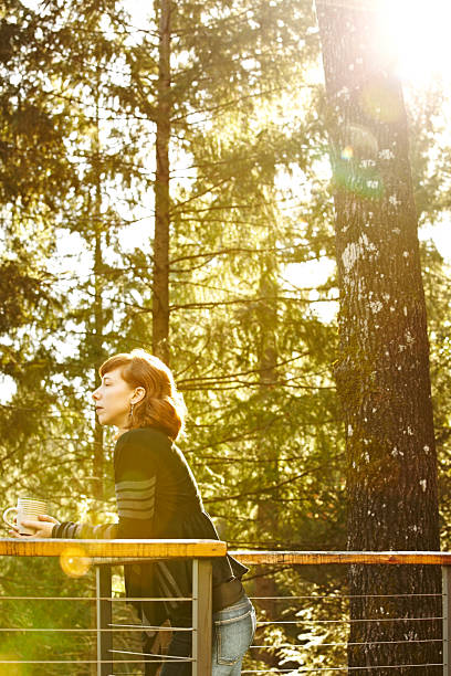 istock Woman relaxing on deck in nature 169946809