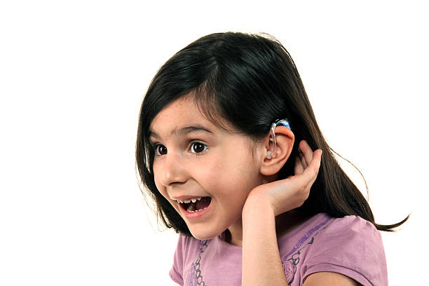 Hearing aid Little girl with hearing aid ear horn photos stock pictures, royalty-free photos & images